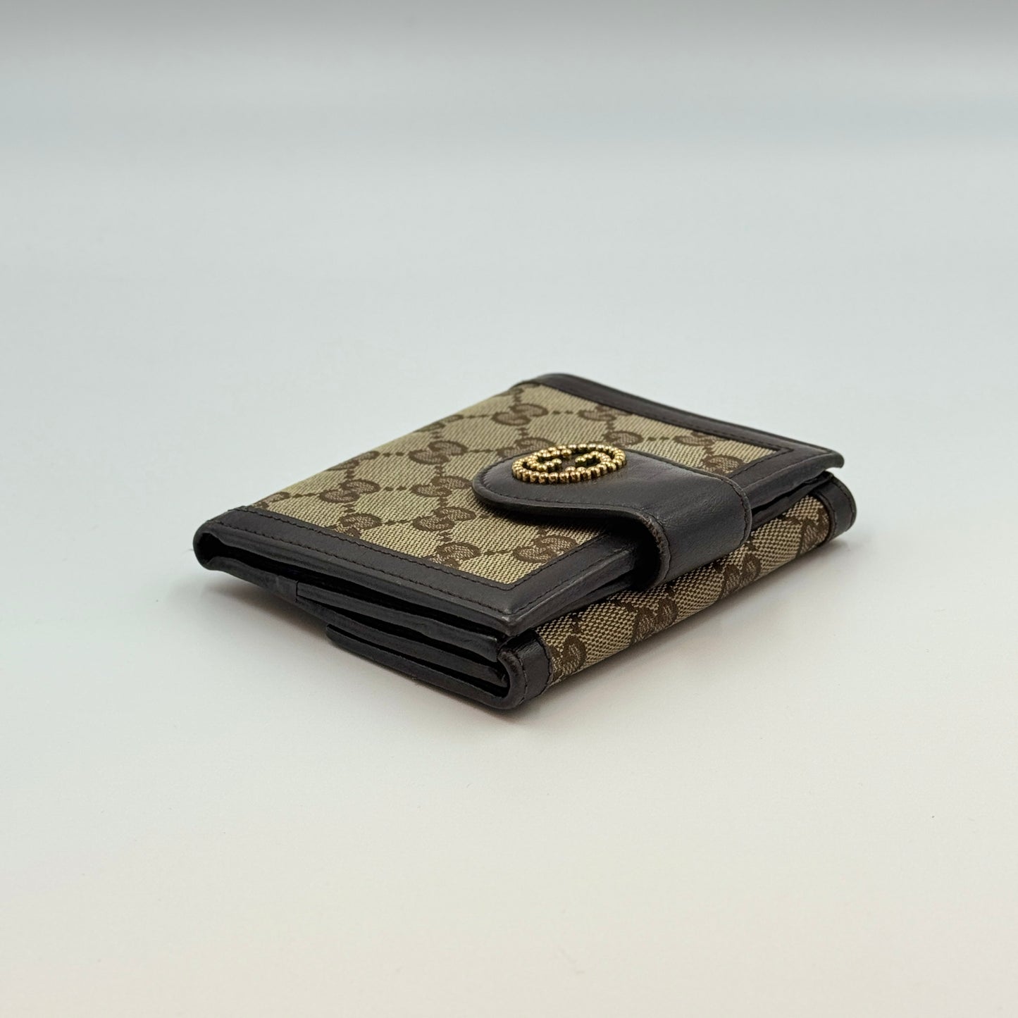 VINTAGE GUCCI STUDDED LOGO CANVAS WALLET