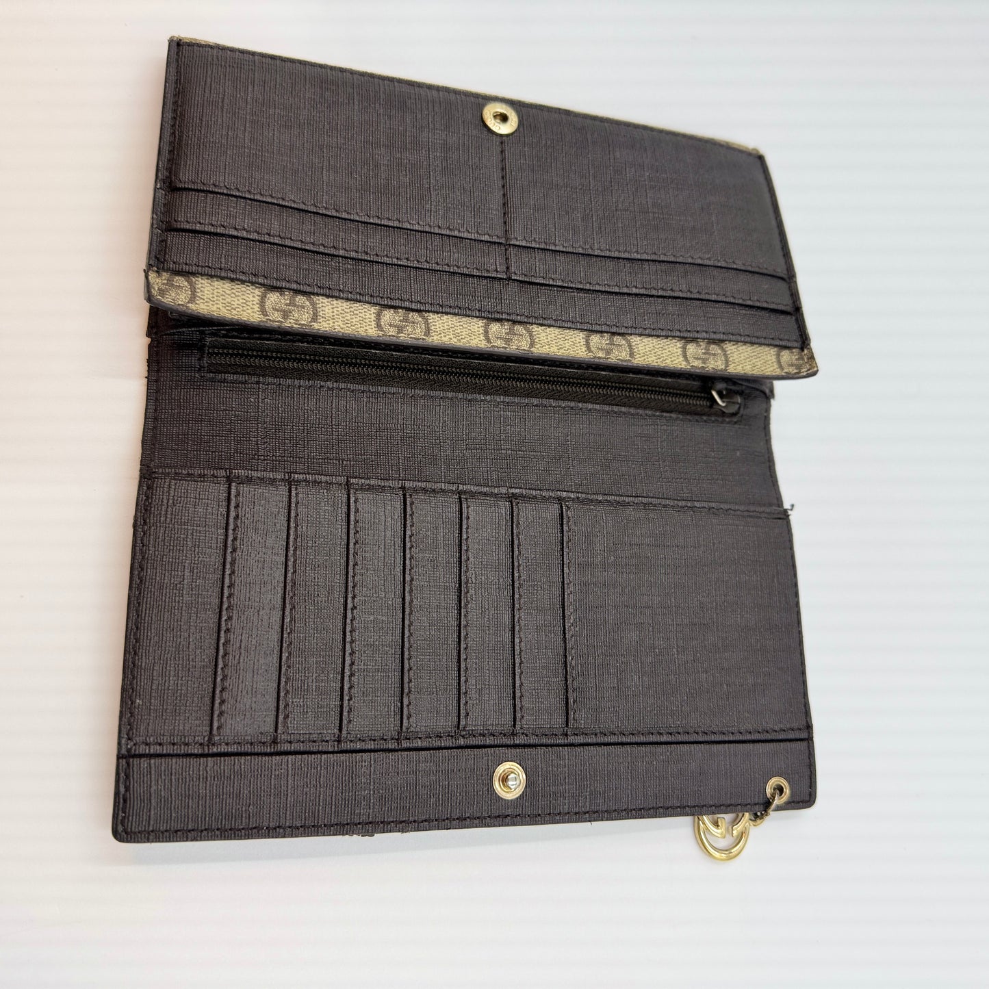 GG Supreme Monogram Flap Wallet