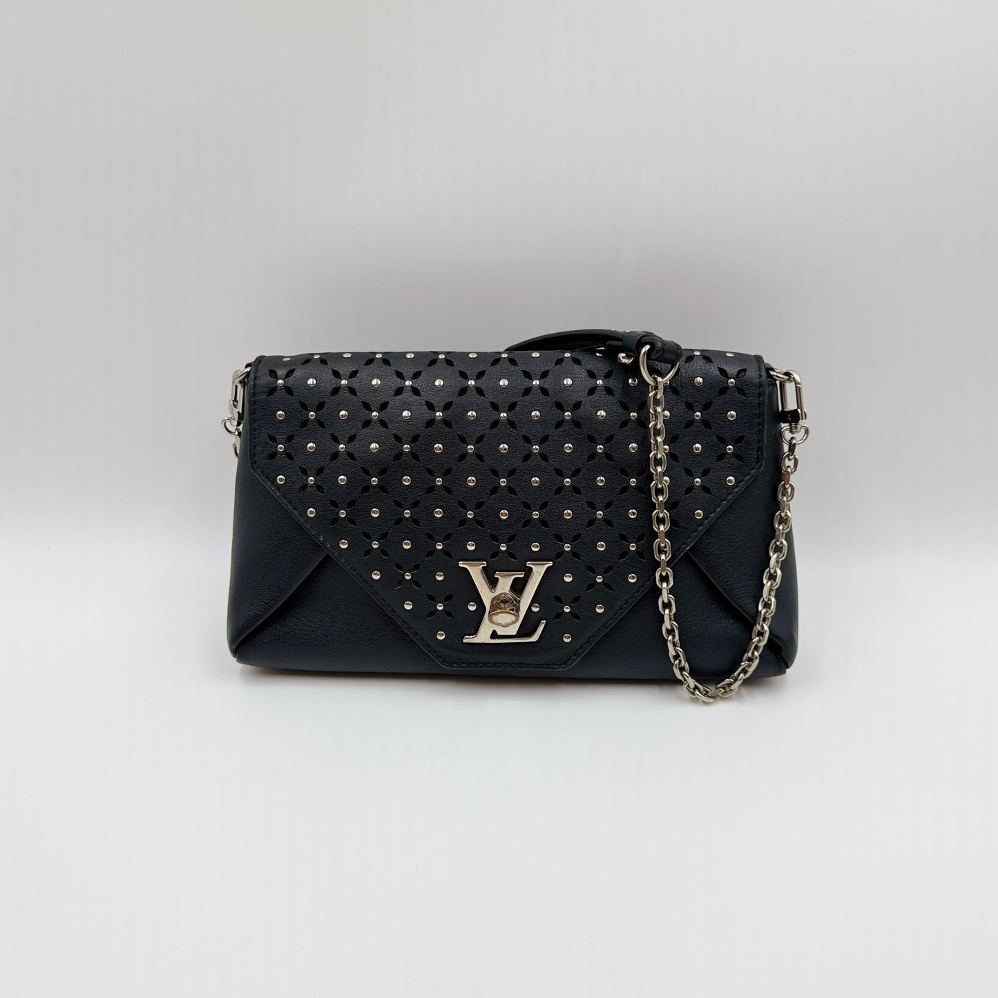 Perforated Studs Love Note Clutch