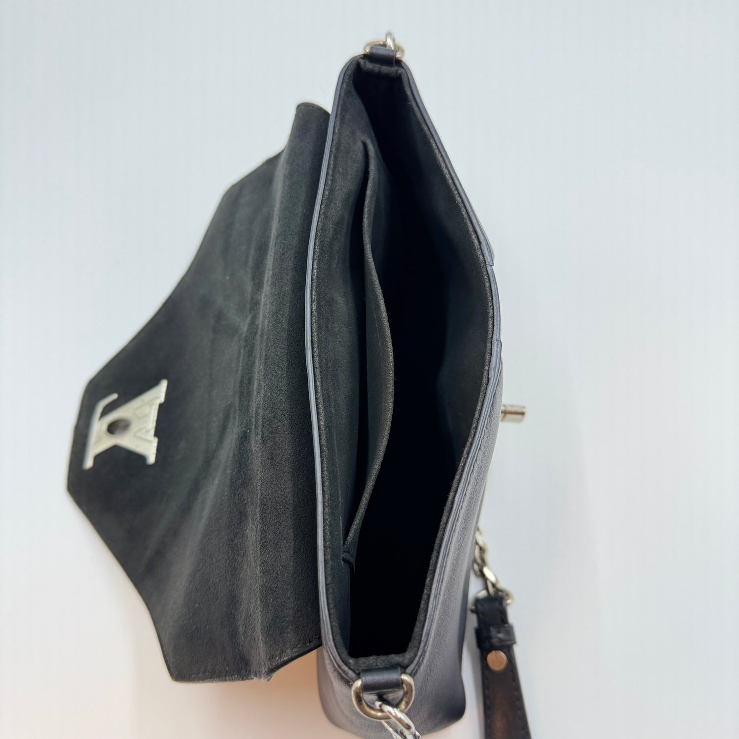 Perforated Studs Love Note Clutch