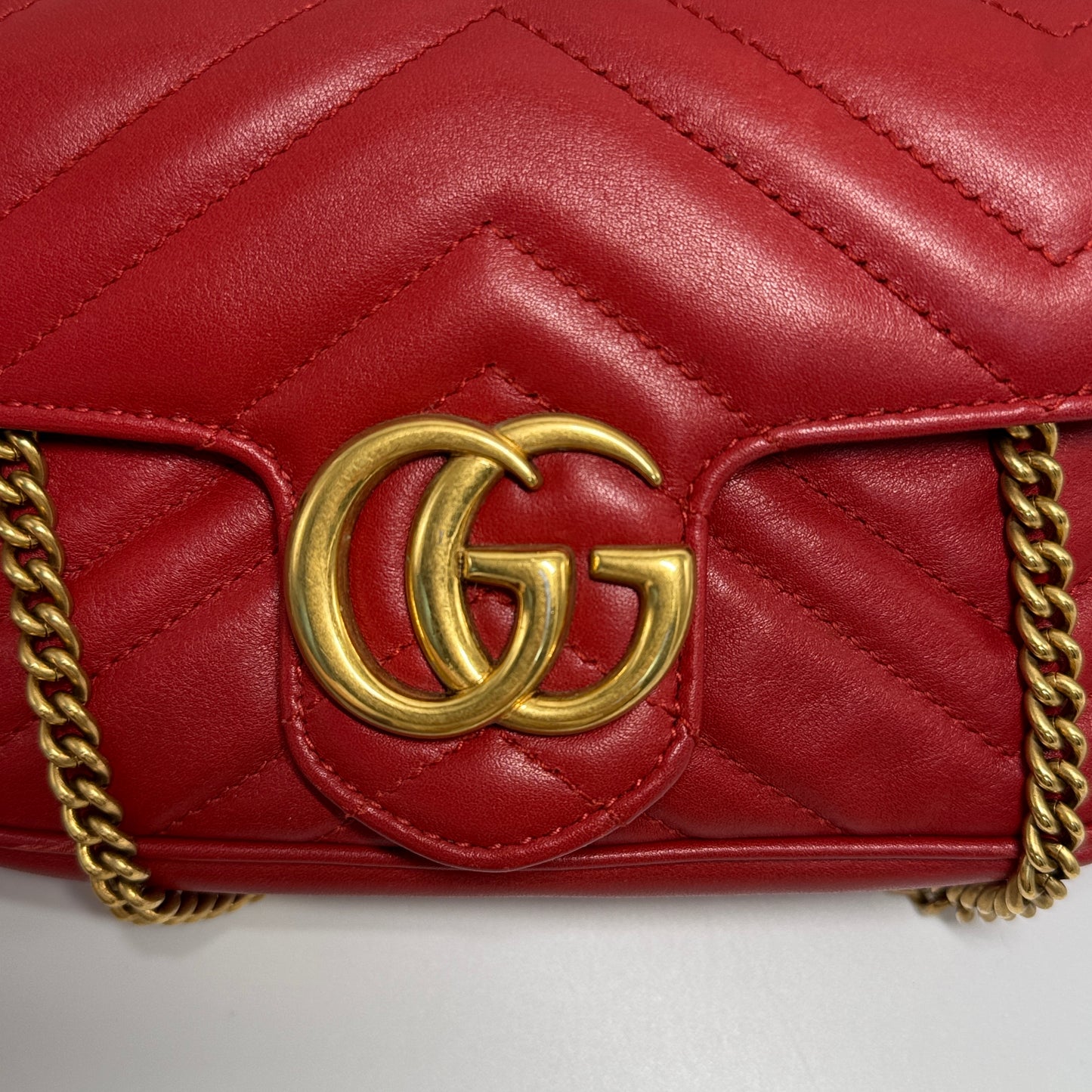 Calfskin Matelasse Super Mini GG Marmont Shoulder Bag Hibiscus Red