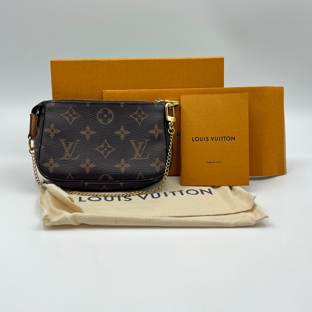 Louis Vuitton Monogram Mini Pochette Accessories Year 2021 — view 1 of 9 Monogram Mini Pochette Accessories Year 2021, view 1 of 9