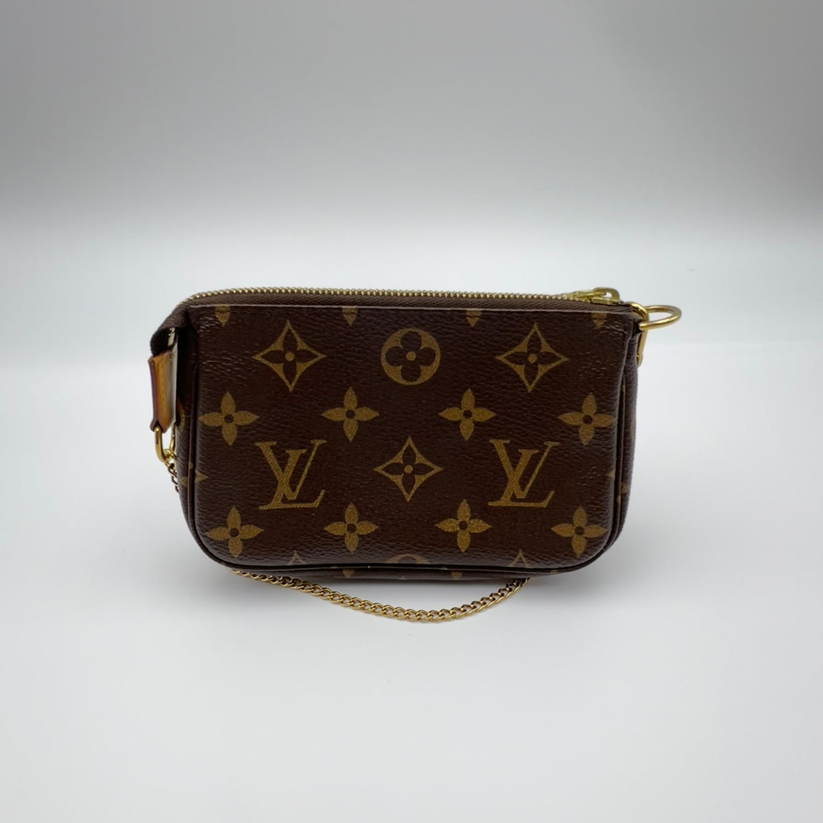 Louis Vuitton Monogram Mini Pochette Accessories Year 2021 — view 2 of 9 Monogram Mini Pochette Accessories Year 2021, view 2 of 9