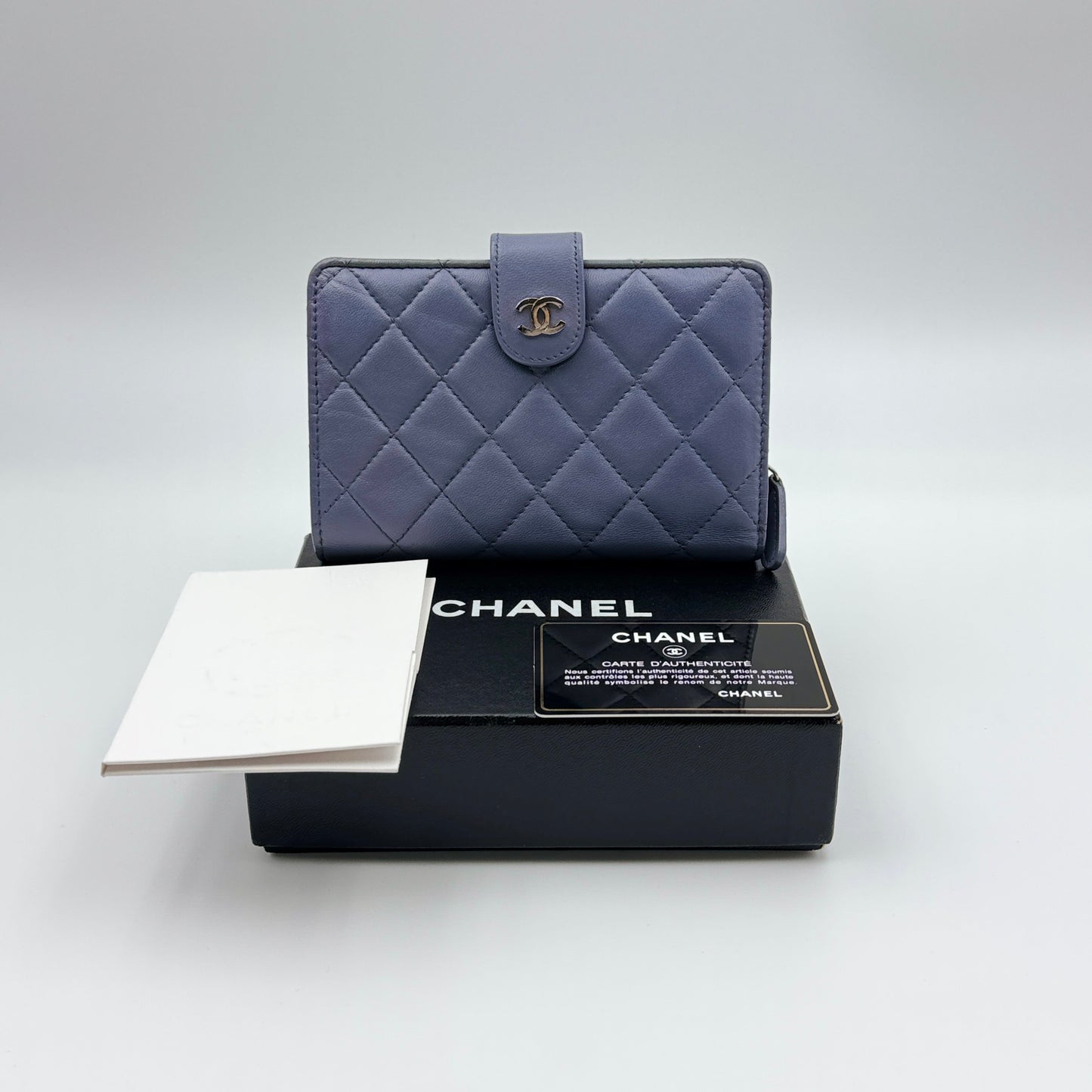 Chanel CC French Wallet in blue quilted leather
