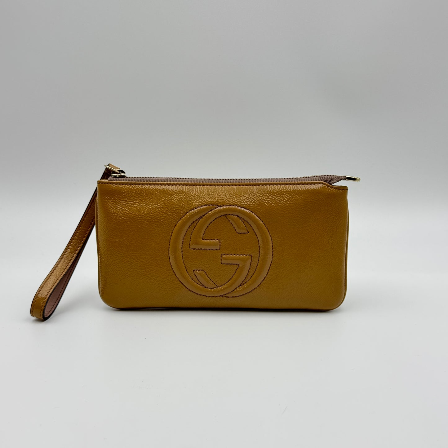 Soho patent leather clutch bag