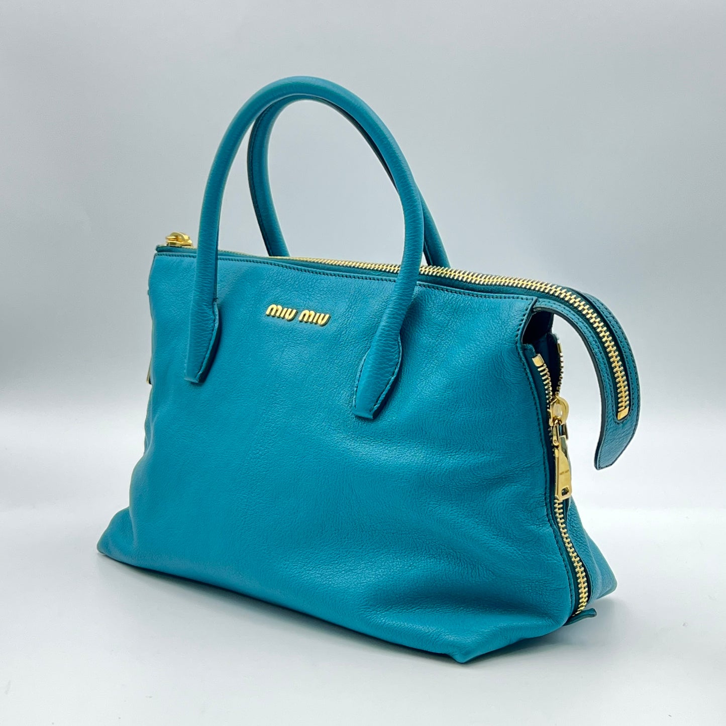 Leather Side Zip Convertible Tote turquoise