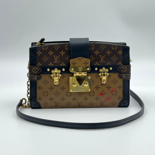 Reverse Monogram Trunk Clutch