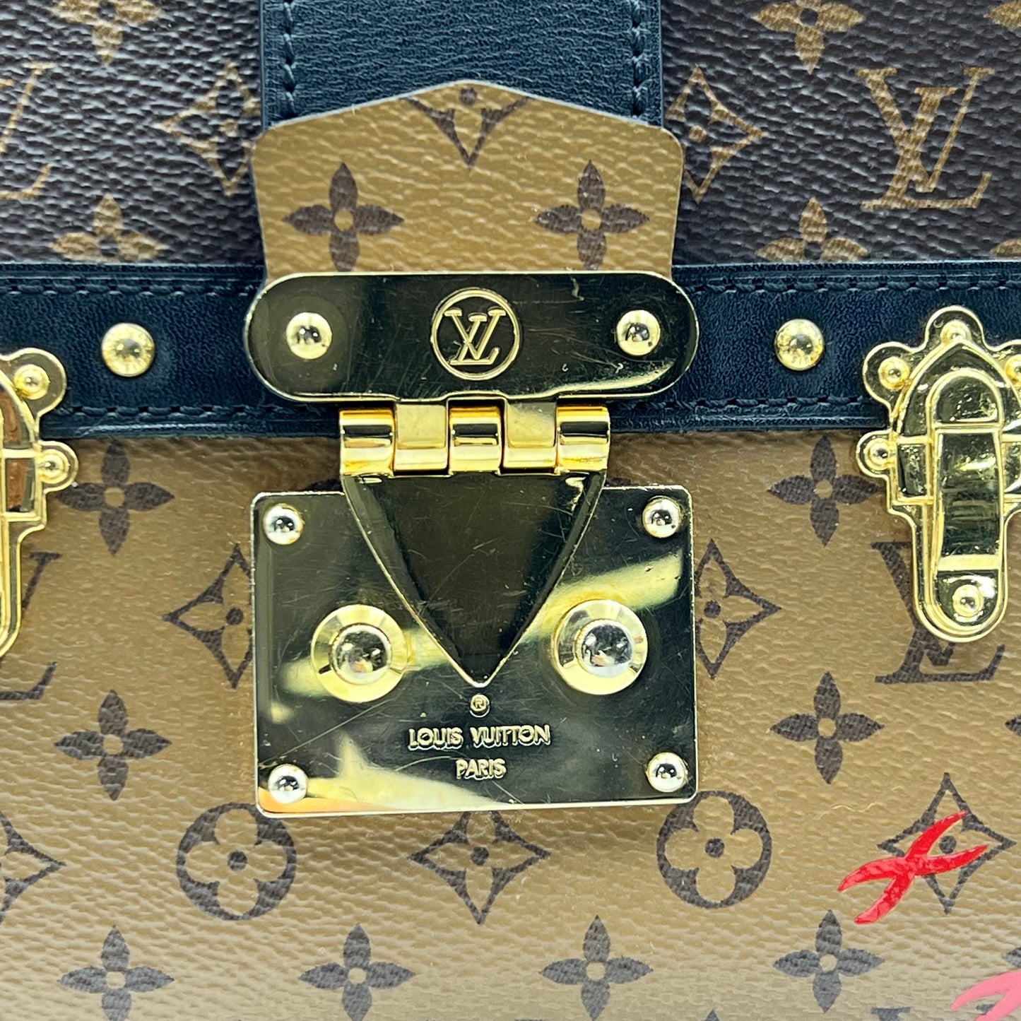 Reverse Monogram Trunk Clutch