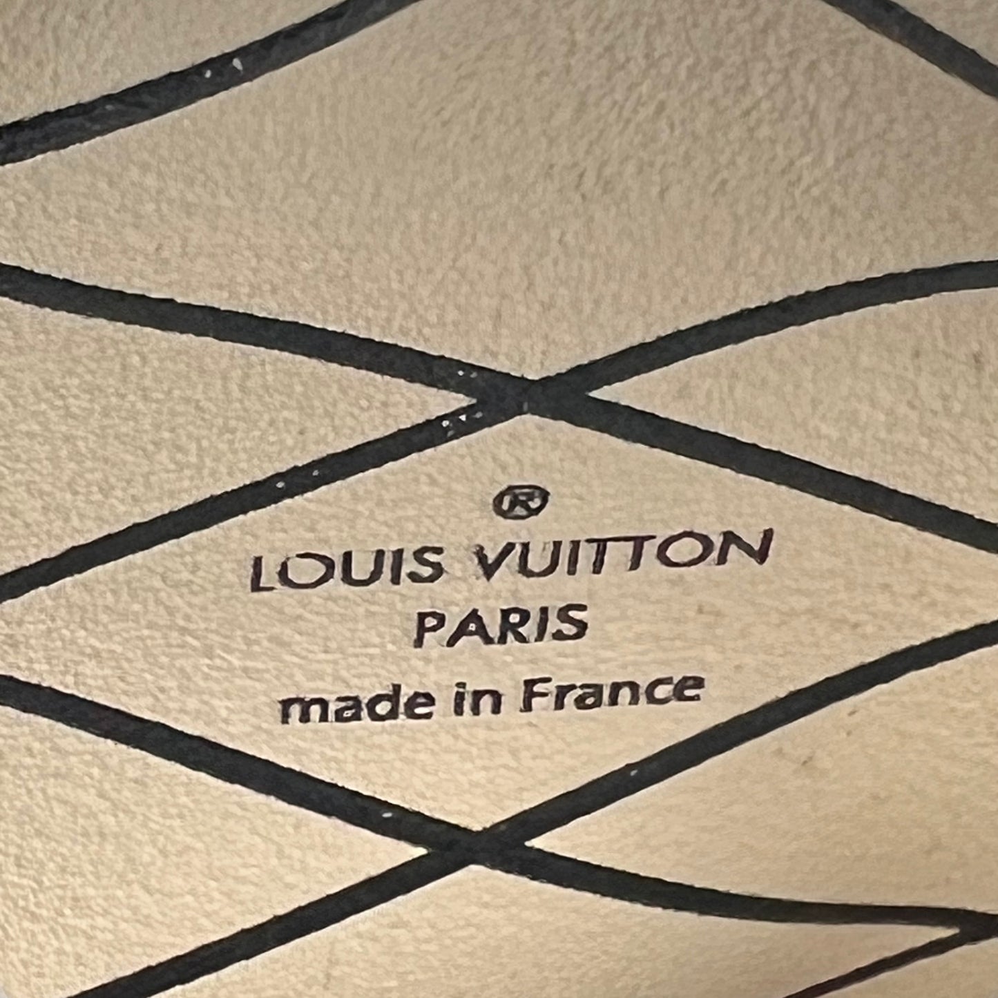 Reverse Monogram Trunk Clutch