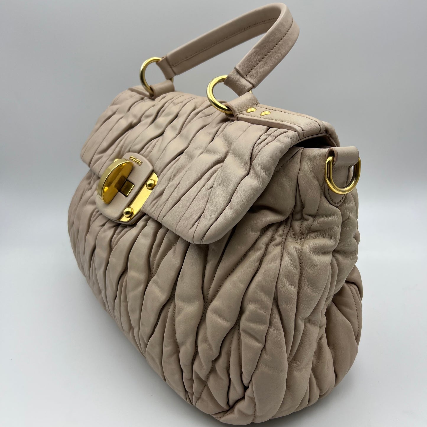 Beige Pink Matelasse Leather Turnlock Top Handle Bag