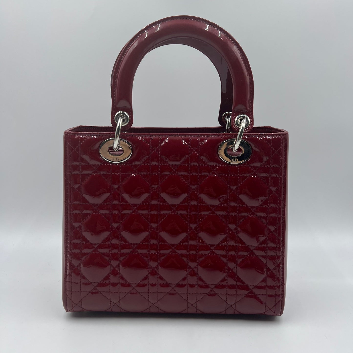 Lady Dior patent leather handbag