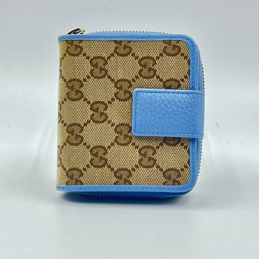 Monogram Dollar Calfskin Zip Around French Flap Wallet