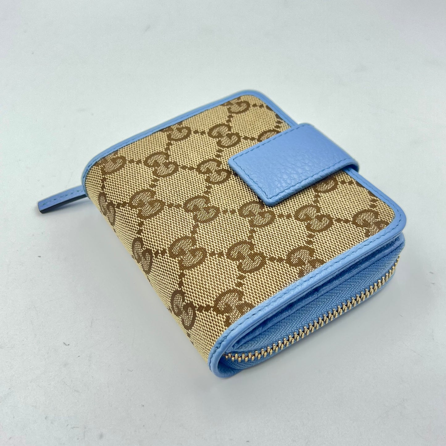 Monogram Dollar Calfskin Zip Around French Flap Wallet