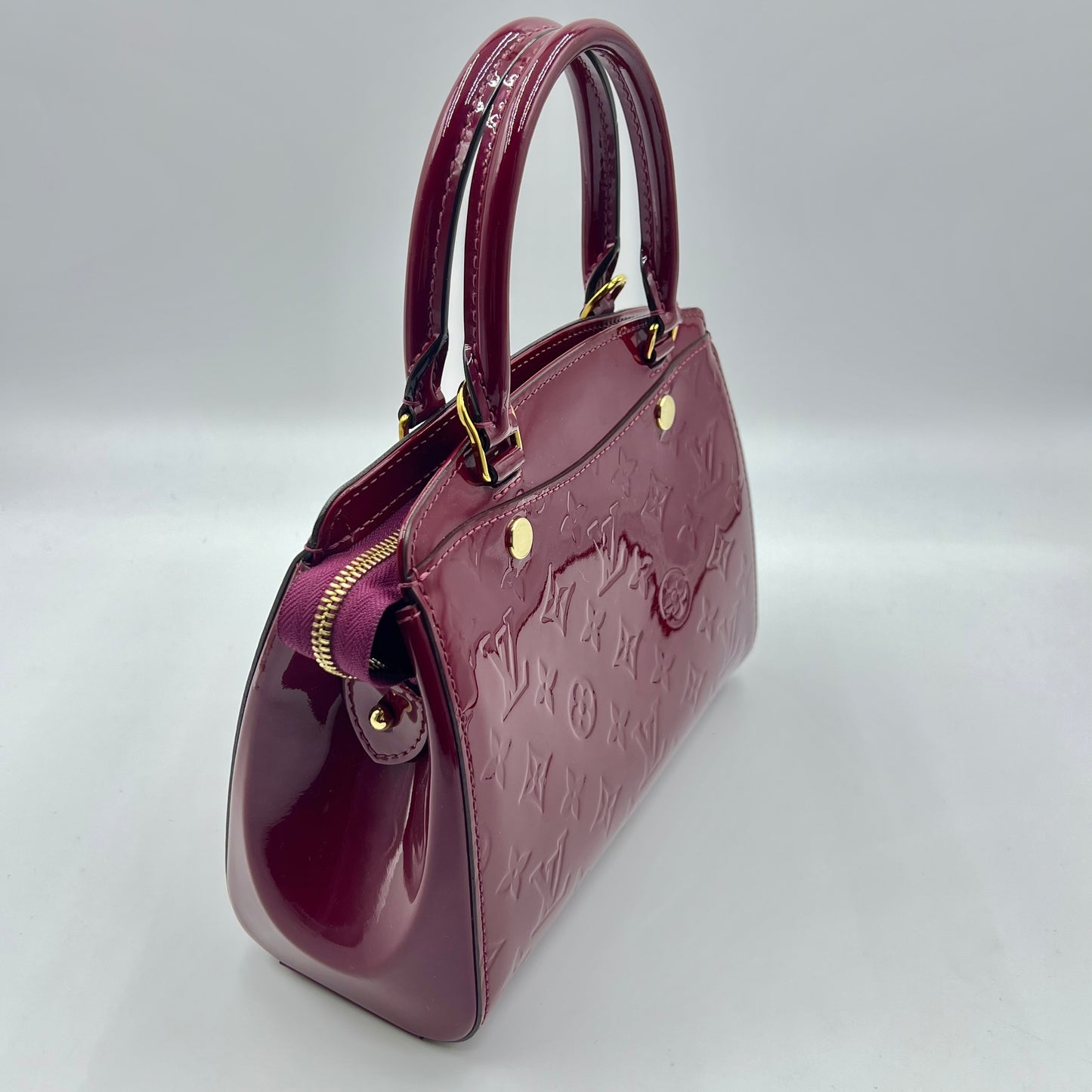 Magenta Monogram Vernis Brea PM NM Bag