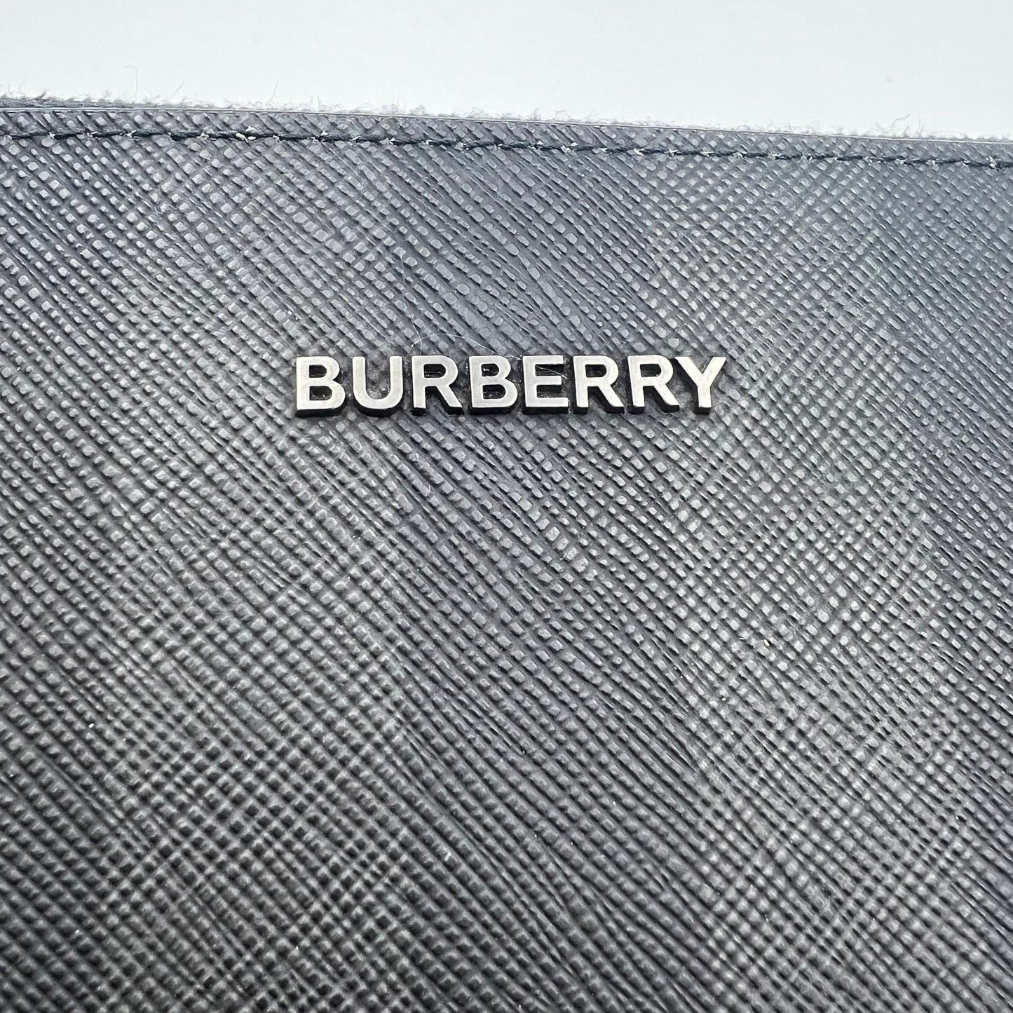 edin checked leather clutch