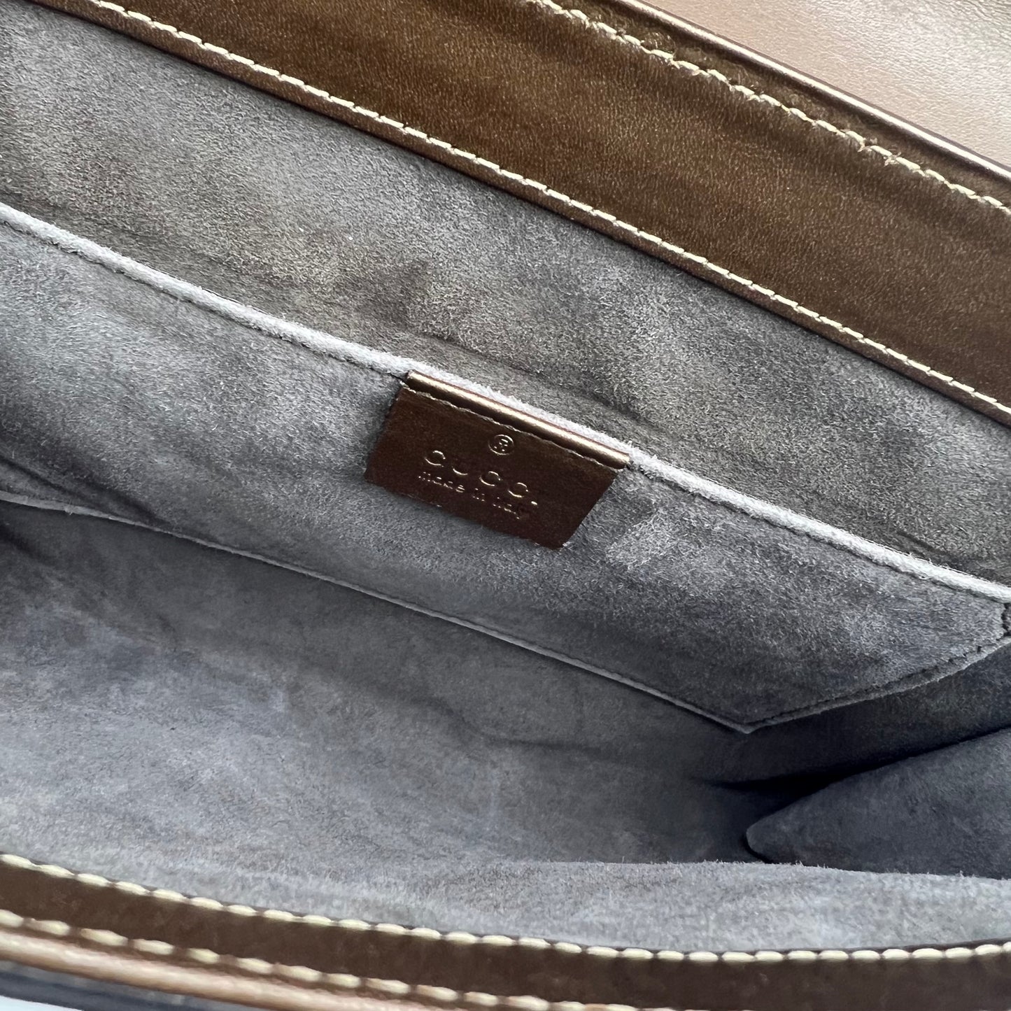 python leather clutch with metallic flap Brown