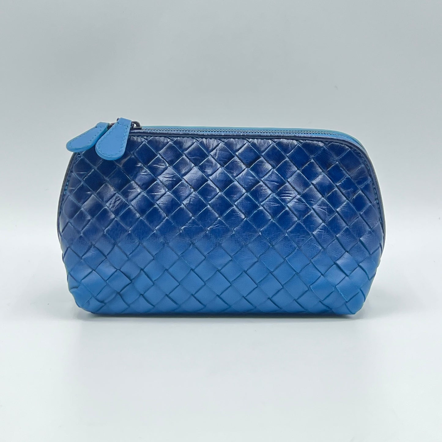 Blue Intrecciato Woven Leather Cosmetic Bag