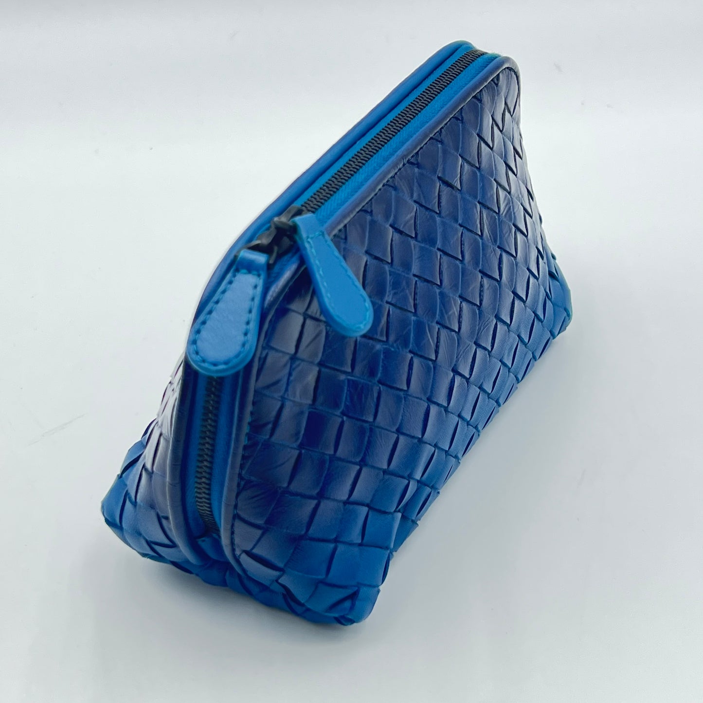Blue Intrecciato Woven Leather Cosmetic Bag