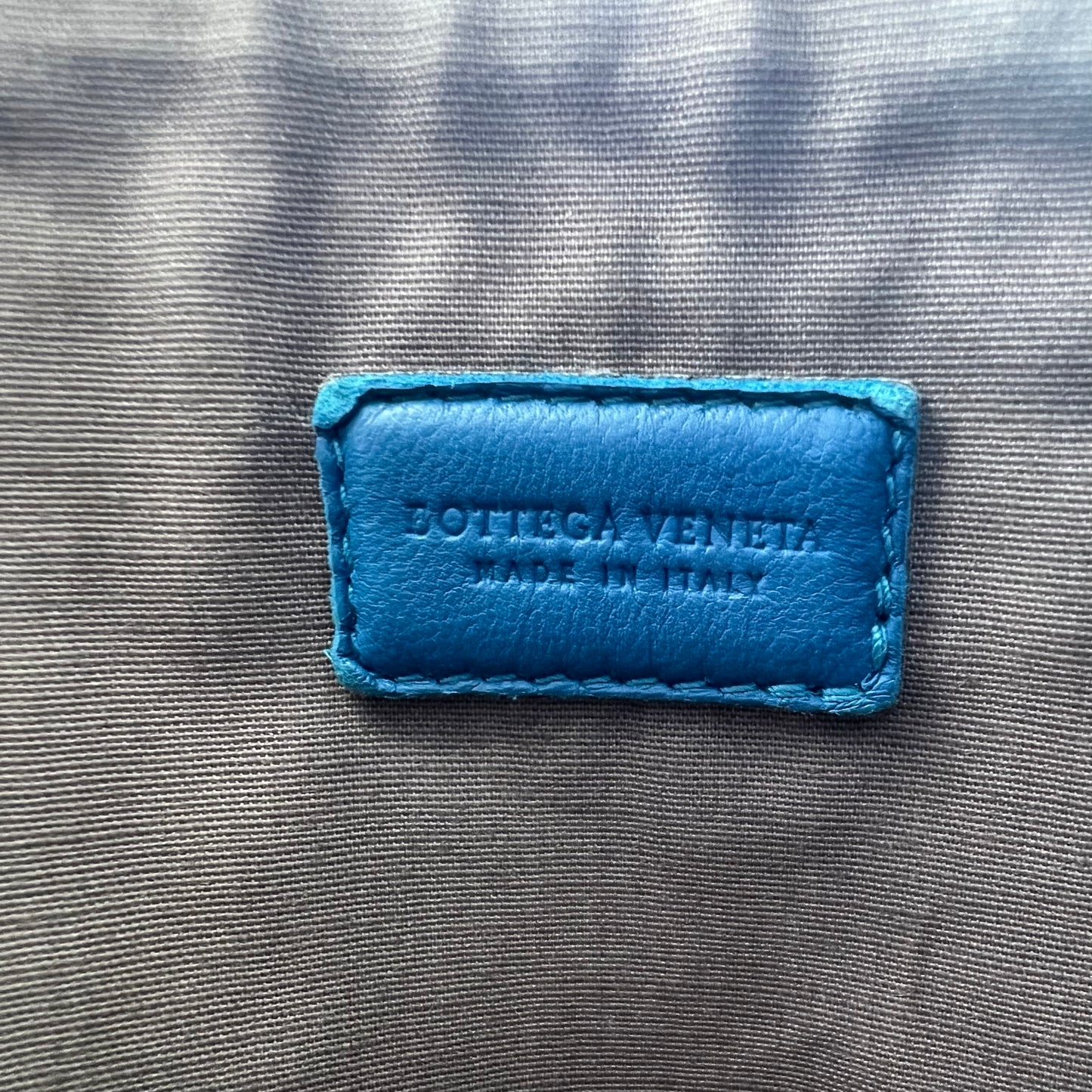 Blue Intrecciato Woven Leather Cosmetic Bag