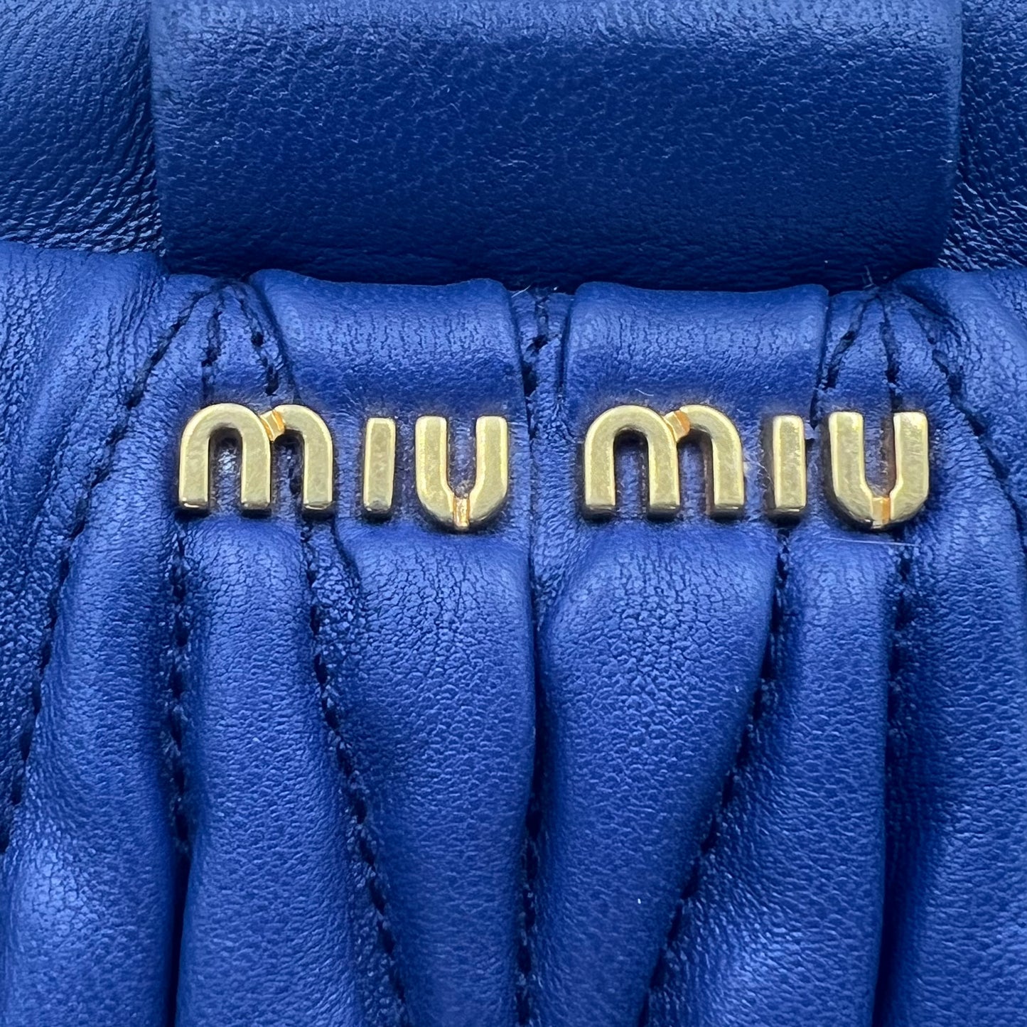 Matelasse Wrislet Clutch Bag Blue