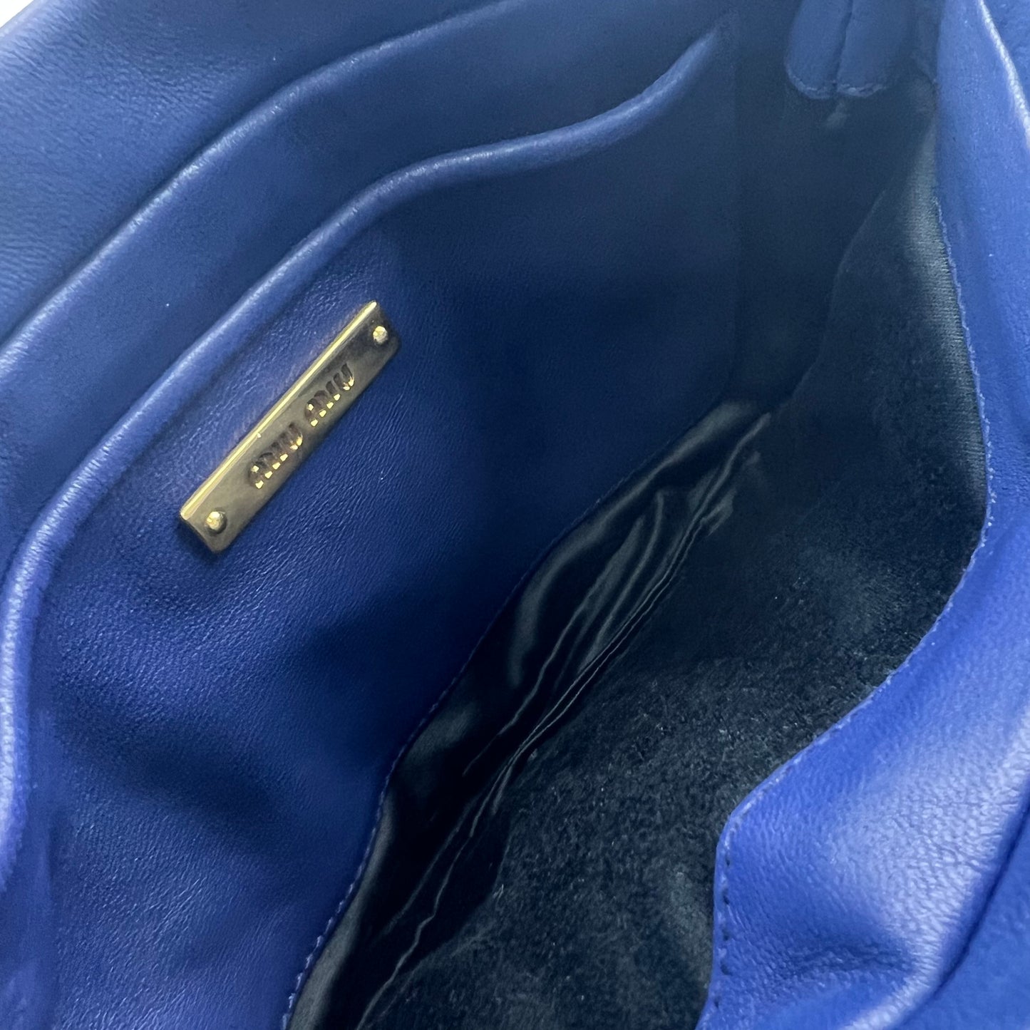 Matelasse Wrislet Clutch Bag Blue