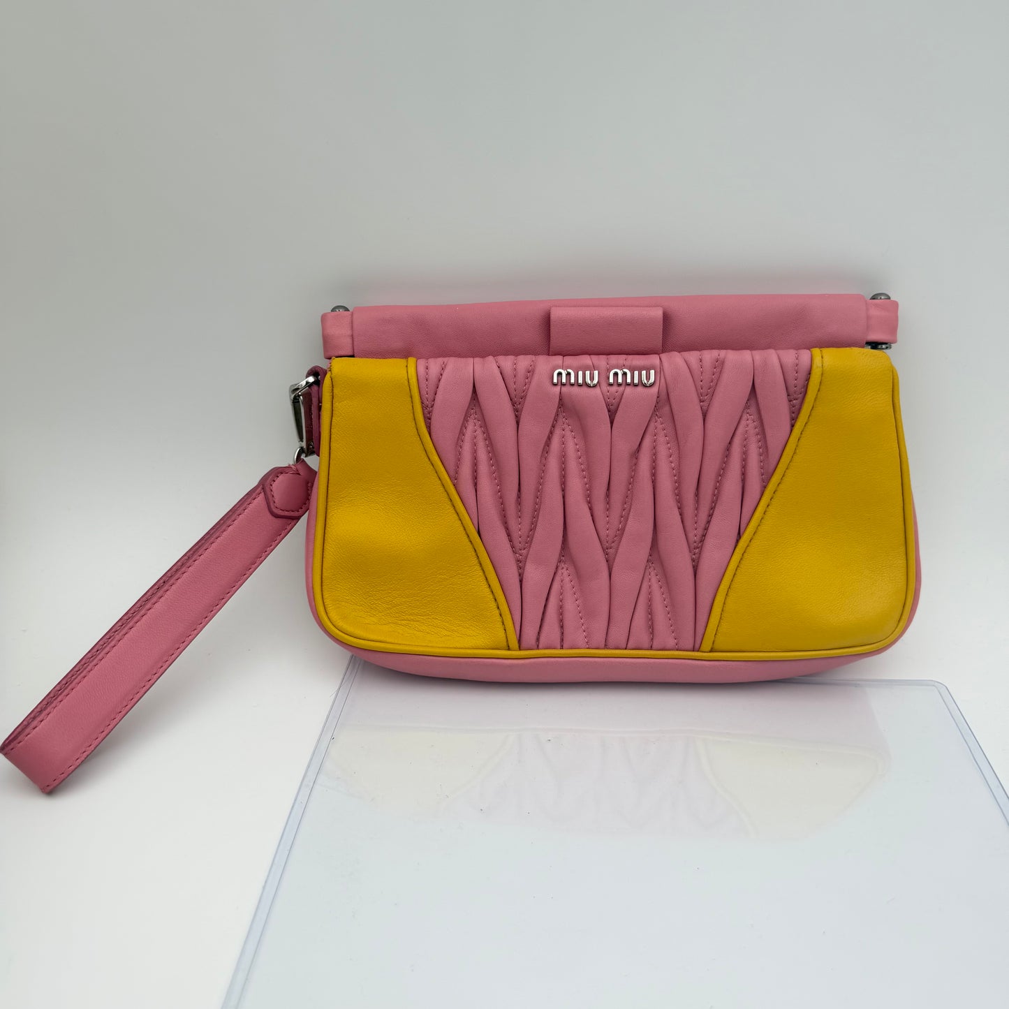 Matelassé leather clutch bag Pink