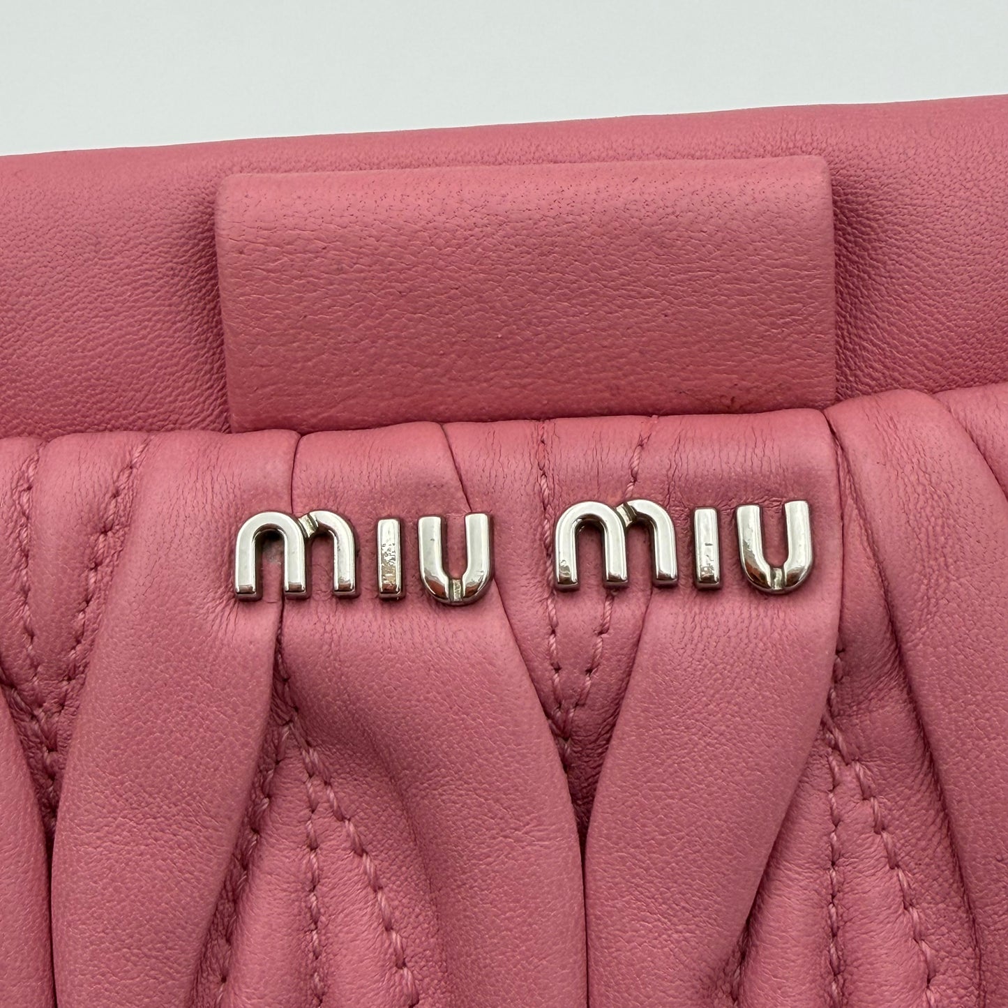 Matelassé leather clutch bag Pink