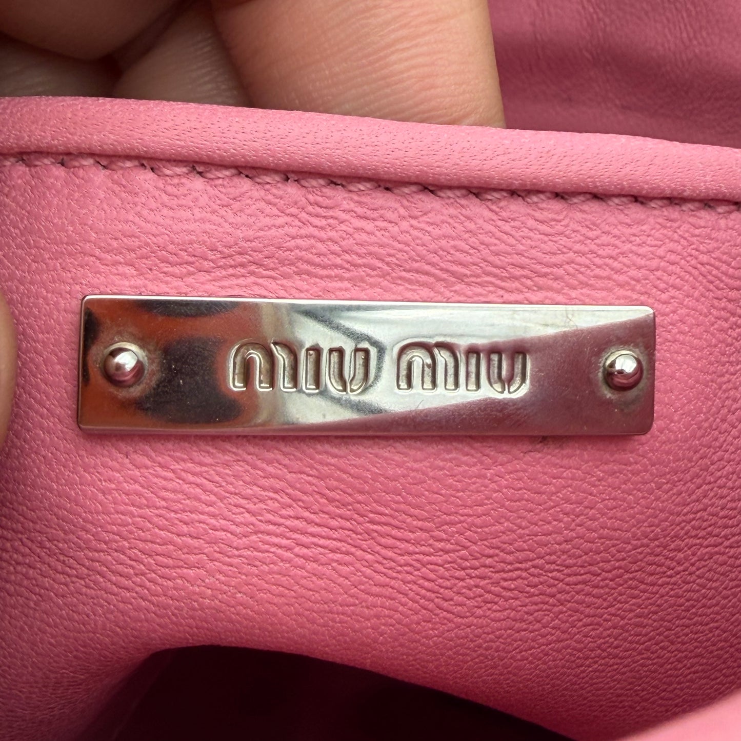 Matelassé leather clutch bag Pink