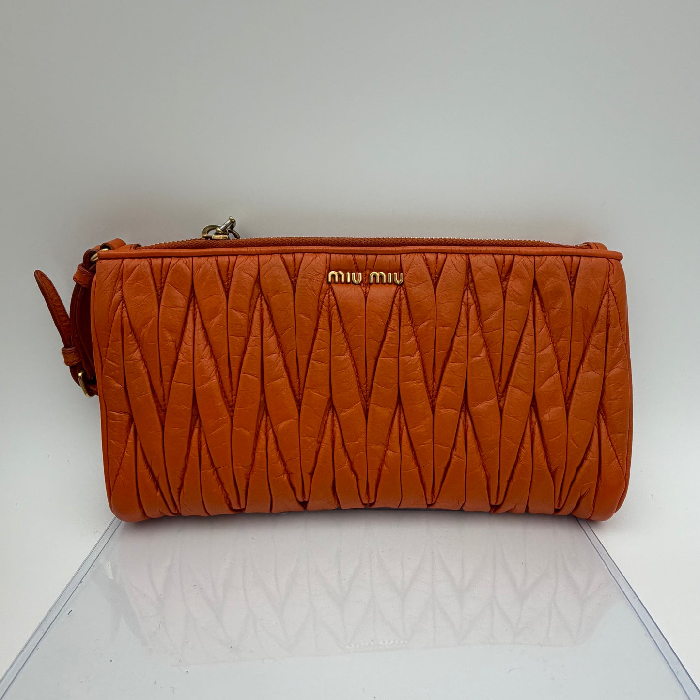 Matelassé leather clutch bag Orange