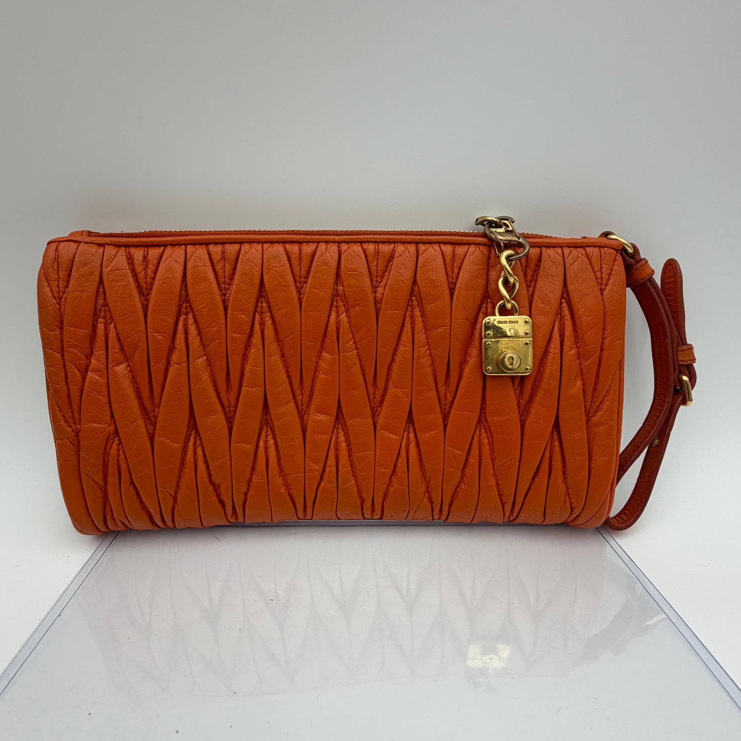 Matelassé leather clutch bag Orange